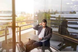 can you travel while working from home
