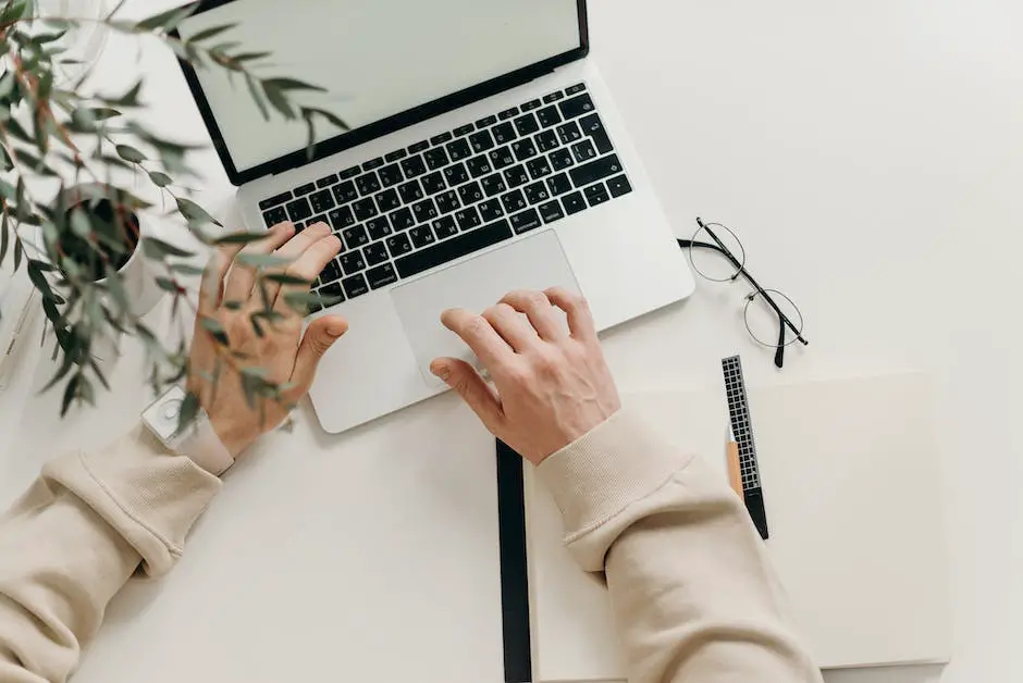 Image of a person working on a laptop, representing setting up a professional profile for freelance translation