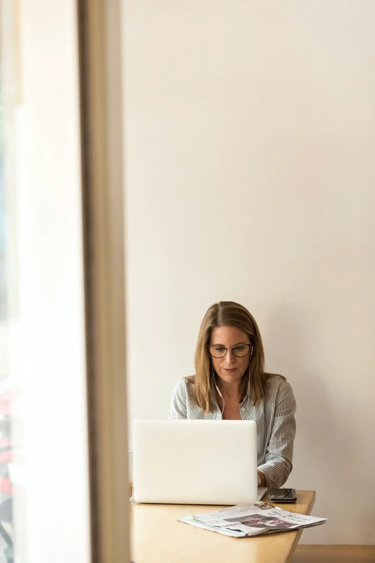 Image depicting a person working on a laptop, symbolizing virtual public relations