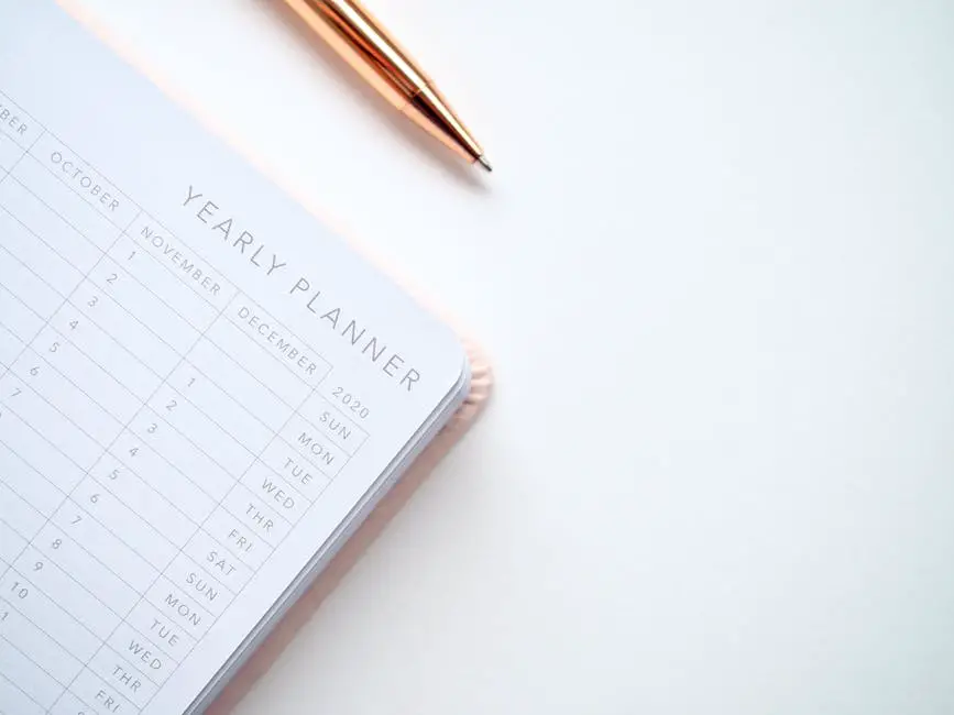 An image showing a person using a planner to manage their time efficiently