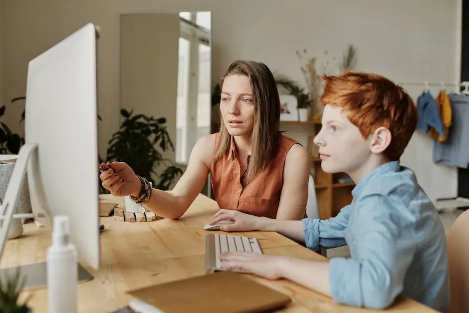 Image of a person sitting at a laptop, tutoring a student online